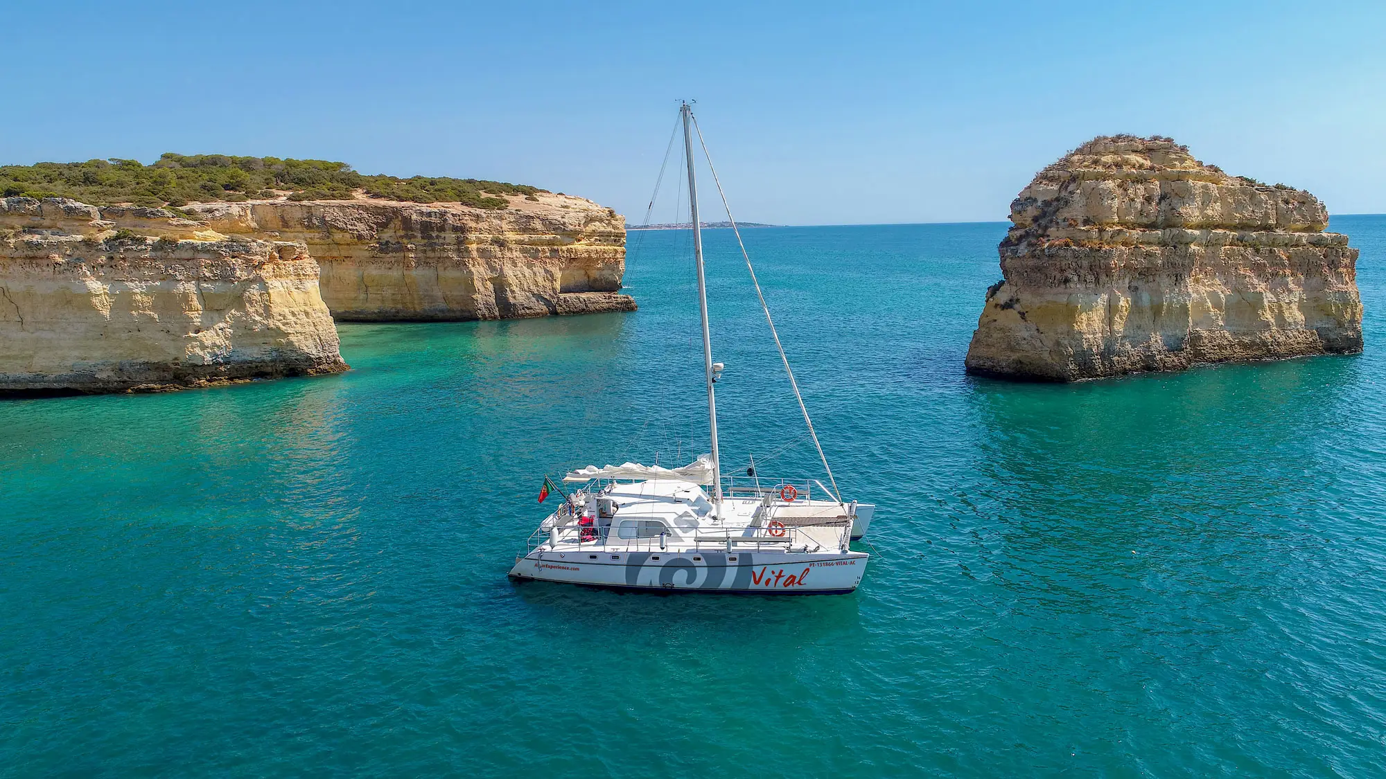Catamaran Albufeira Beautiful sailing catamaran in front of the coast of Albufeira